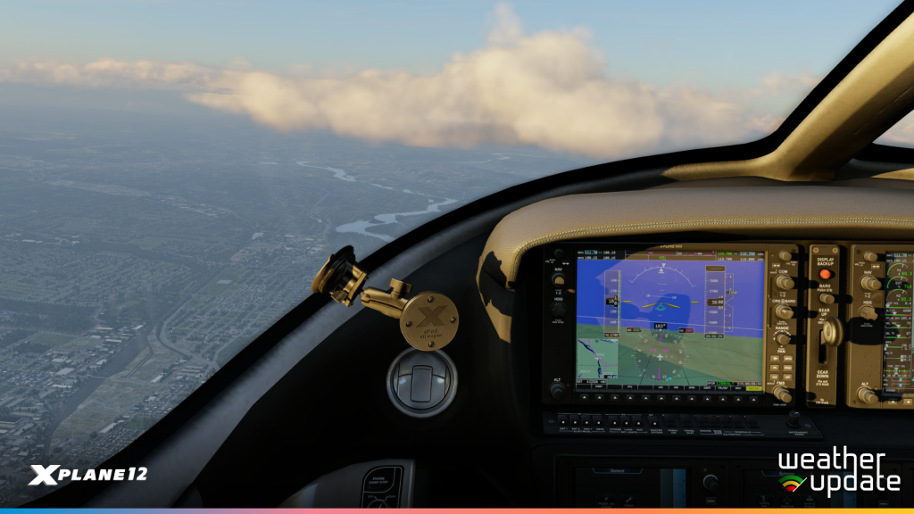 Vue du cockpit montrant l'affichage météo et terrain mis à jour du G1000.