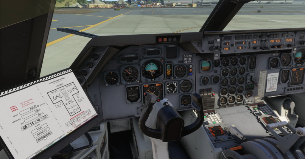 Vue du capitaine des instruments du cockpit iniBuilds L-1011 TriStar et du sac de vol électronique montrant les calculs des données de décollage dans Microsoft Flight Simulator 2024.