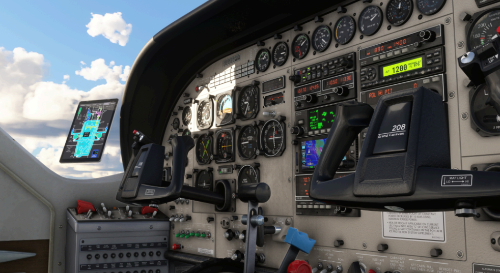 Cockpit MSFS Black Square Caravan avec interface tablette et instrumentation entièrement analogique pendant le vol