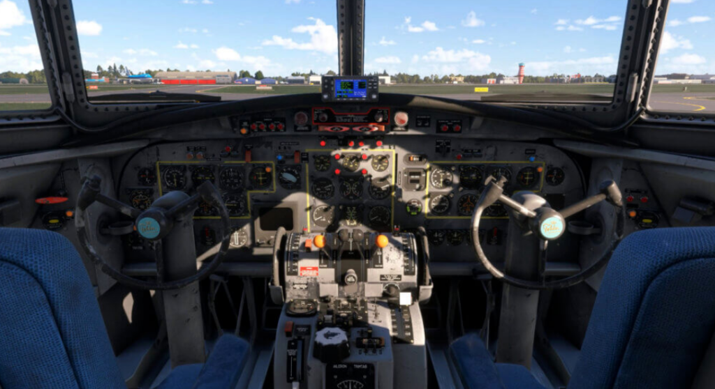 Cockpit du Fokker F27 Friendship dans MSFS 2024 montrant des instruments analogiques détaillés et des systèmes de poste de pilotage