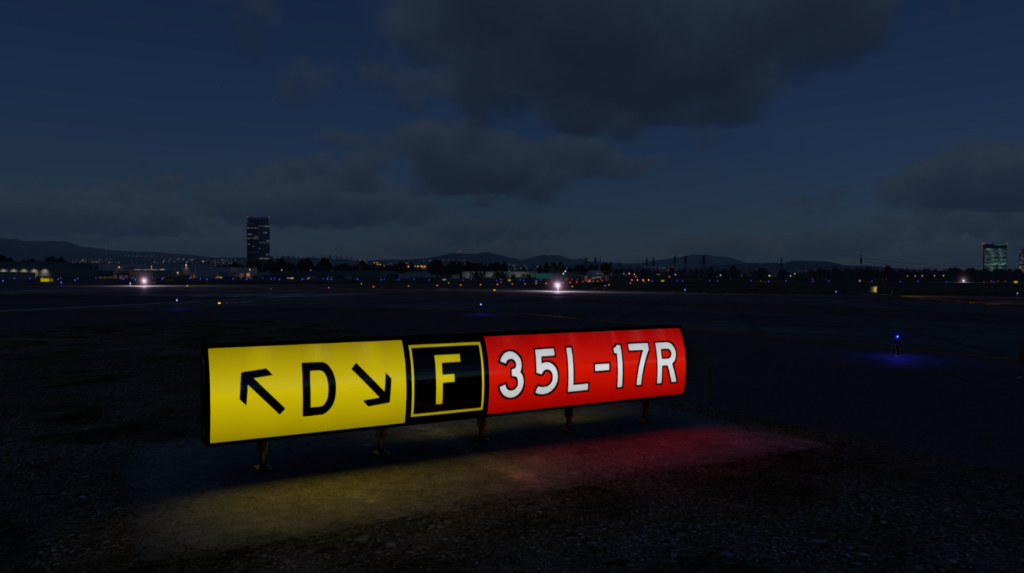 Panneaux de voie de circulation lumineux la nuit dans le package d'amélioration de l'aéroport pour X-Plane 12