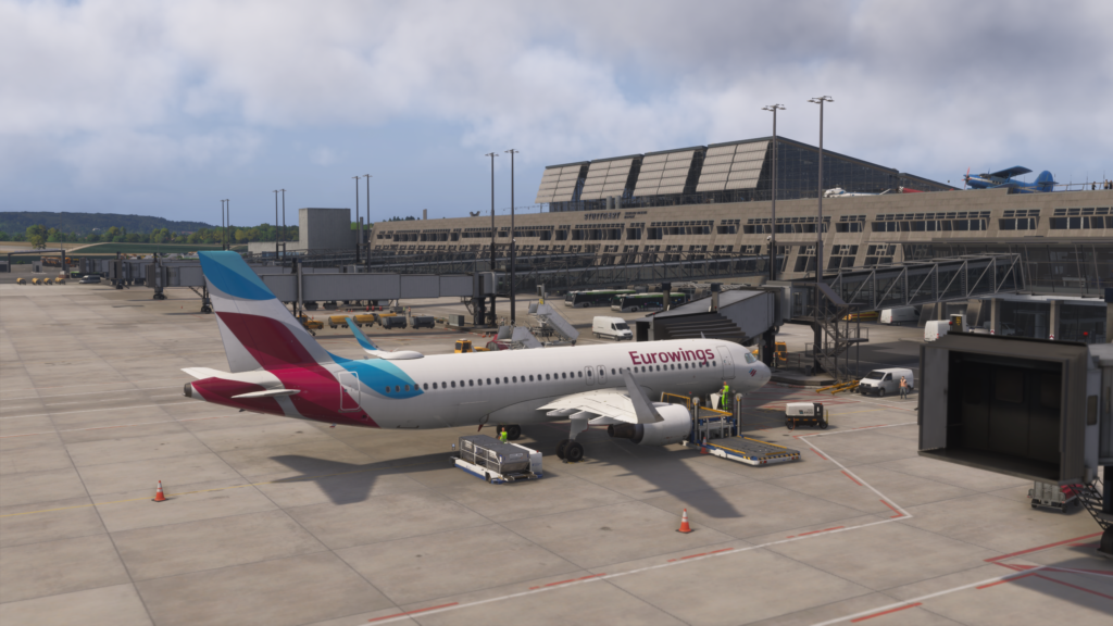 Tablier de l'aéroport d'Aerosoft Stuttgart Véhicules d'assistance au sol des avions Eurowings Opérations de paysage MSFS 2024