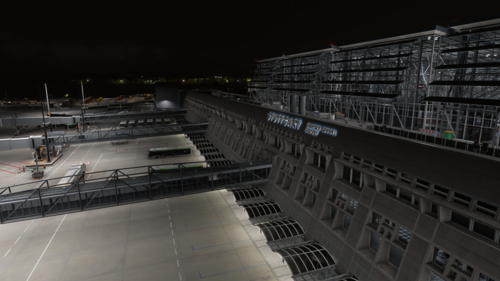 Les passerelles de nuit extérieures du terminal de l'aéroport de Stuttgart éclairent le paysage Microsoft Flight Simulator 2024 avec des détails élevés
