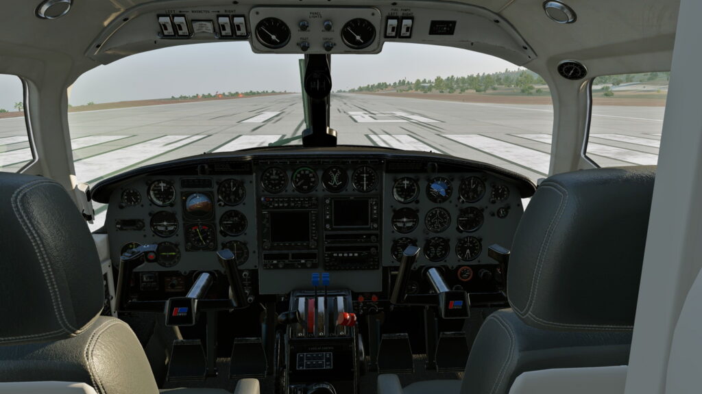 Cockpit CIS Piper Chieftain avec jauges analogiques et avionique sur la piste
