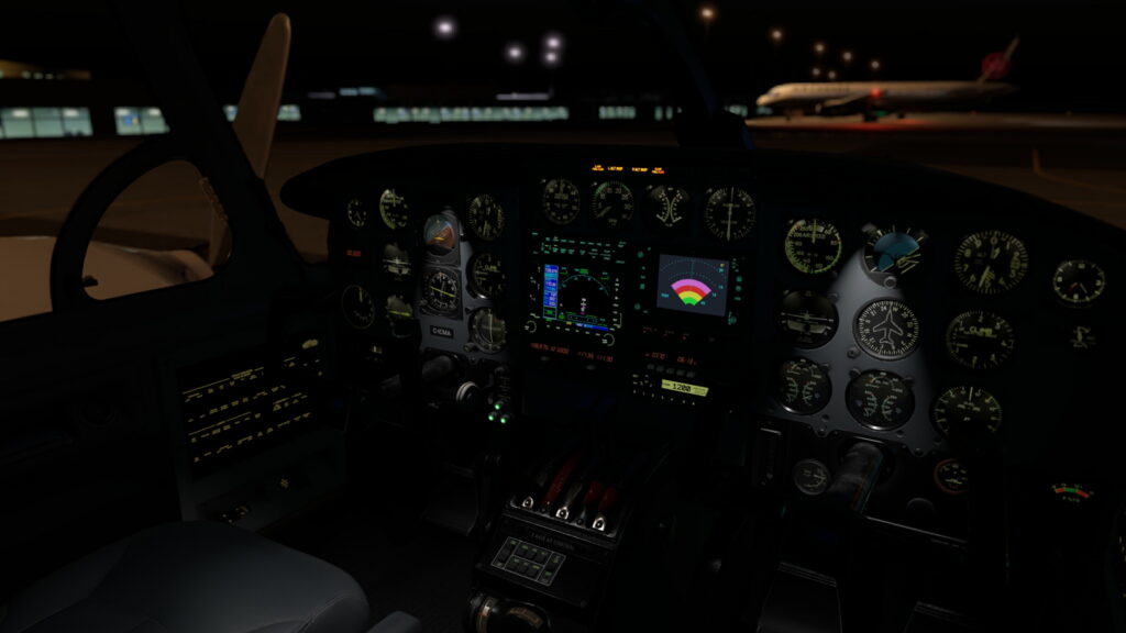 Cockpit CIS Piper Chieftain avec jauges à vapeur et avionique moderne la nuit