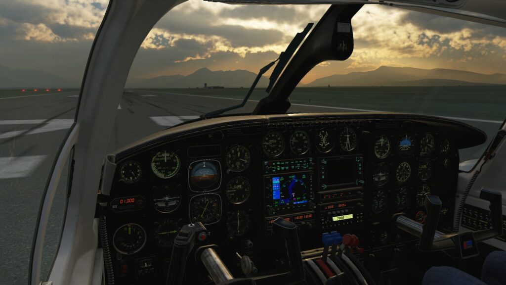 Cockpit CIS Piper Chieftain avec jauges à vapeur et avionique moderne au coucher du soleil sur la piste