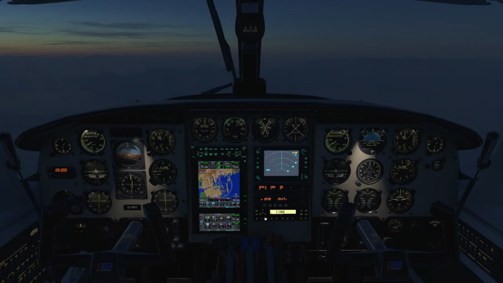 Cockpit au crépuscule avec instruments éclairés et avionique pendant le vol de nuit